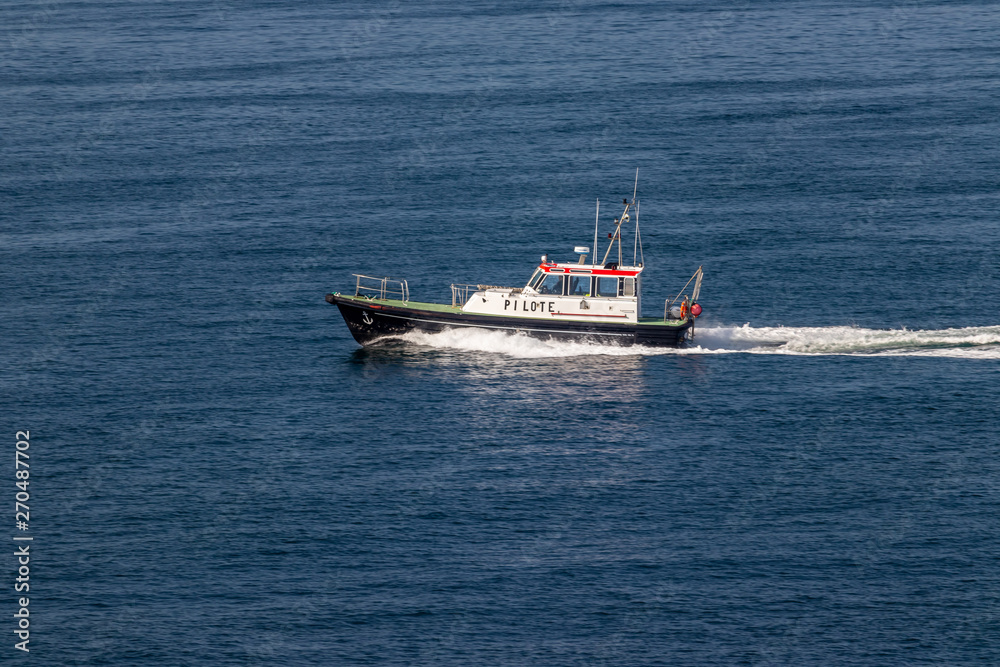 View of a pilot boat coming out to meet a ship