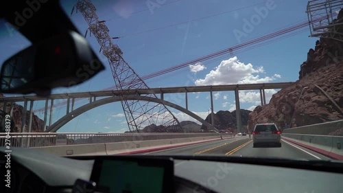 Driving at Hoover dam at convertible car