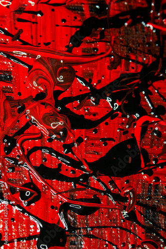 Red and Black Thick Paint Lines and Abstract Splatters on Canvas