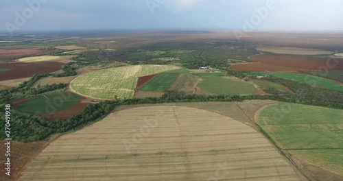 Aerial view of sparsely irrigated fields due to drought and shortage of water for agriculture photo