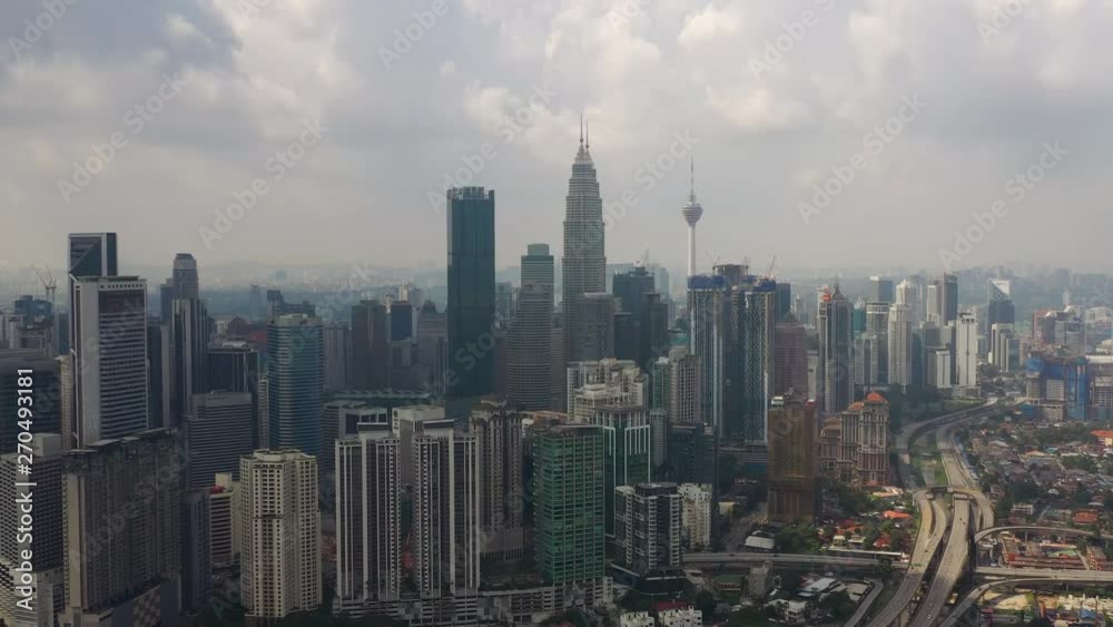 day time flight over kuala lumpur city downtown traffic road junction aerial panorama 4k malaysia day time flight over kuala lumpur city downtown traffic road junction aerial panorama 4k malaysia
