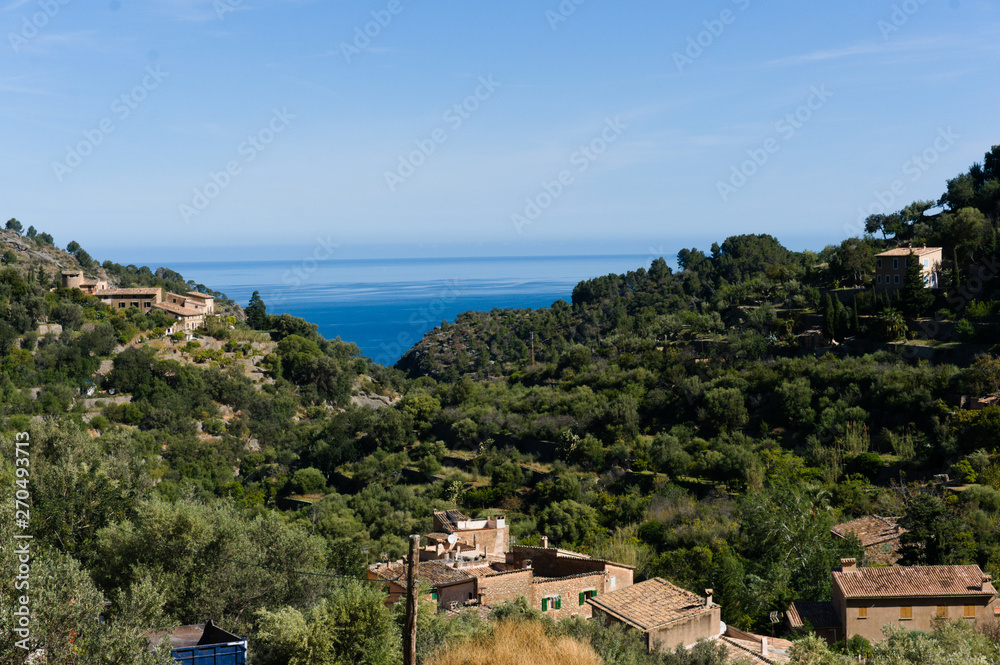 Beautiful view of the old mediterranean mountain village Deia, Spain Majorca, Balearic Islands.