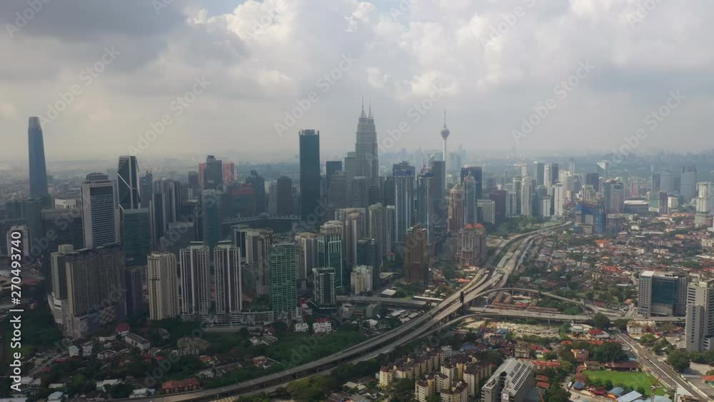day time flight over kuala lumpur city downtown traffic road junction aerial panorama 4k malaysia day time flight over kuala lumpur city downtown traffic road junction aerial panorama 4k malaysia