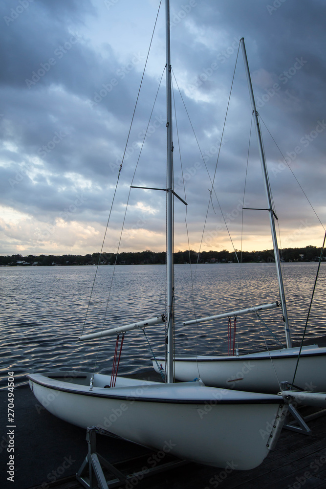 Two white sail boats