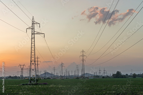Amazing Sunset view over High-voltage power lines in the land around city of Plovdiv, Bulgaria © Stoyan Haytov