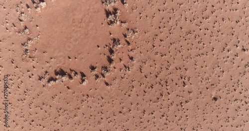 Aerial fly over of the famous fairy circles in the NamibRand Nature Reserve
