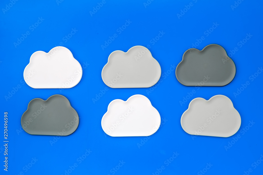 cloud computing concept with clouds on blue background top view cloud computing concept with clouds on blue background top view