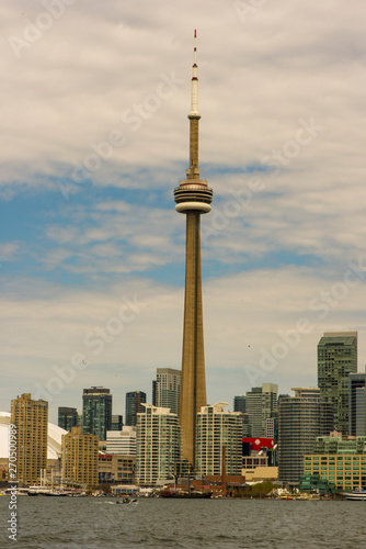 The CN Tower (French: Tour CN) is a 553.3 m-high (1,815.3 ft) concrete communications and observation tower located in Downtown Toronto, Ontario, Canada.[5][8] Built on the former Railway Lands, it wa
