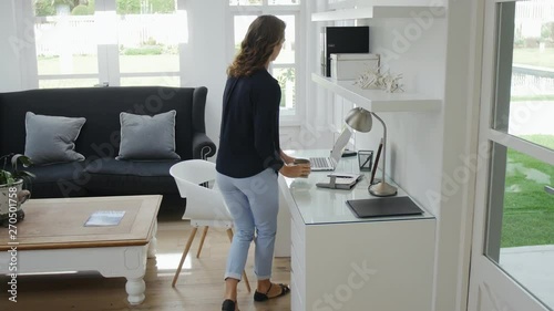 Woman walking into office