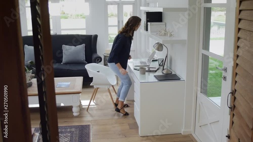 Woman walking into office