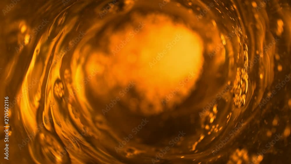 Super slow motion of pouring fuel oil in whirl shape. Filmed on high speed cinema camera, 1000 fps.