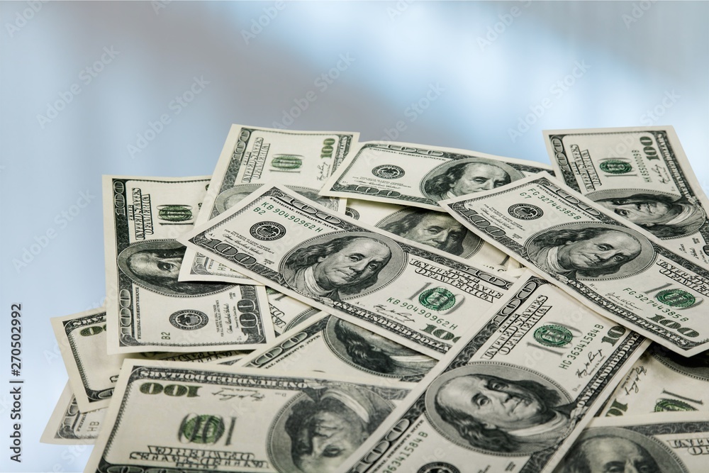 Stack of money with house on white isolated background Stack of money with house on white isolated background