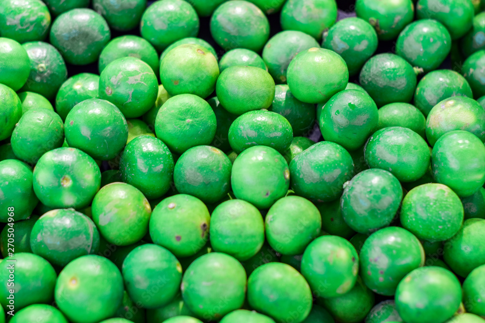 Green lemon for selling on supermarket Green lemon for selling on supermarket
