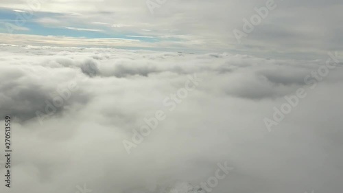 Between Clouds Layers Aerial Panorama Over High Altitude Above Sea Level Mountain Peaks 4k photo