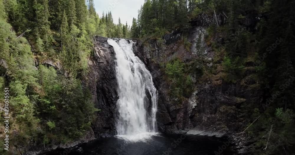 Aerial of the waterfall Storfossen in Malvik in the country of Norway, close to the city of Trondheim. Springtime with a lot of water. Aerial of the waterfall Storfossen in Malvik in the country of Norway, close to the city of Trondheim. Springtime with a lot of water.