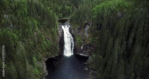 Aerial of the waterfall Storfossen in Malvik in the country of Norway, close to the city of Trondheim. Springtime with a lot of water. photo