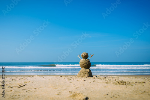sandy happy  man on the sea beach against blue cloudy summer sky - travel concept © exebiche