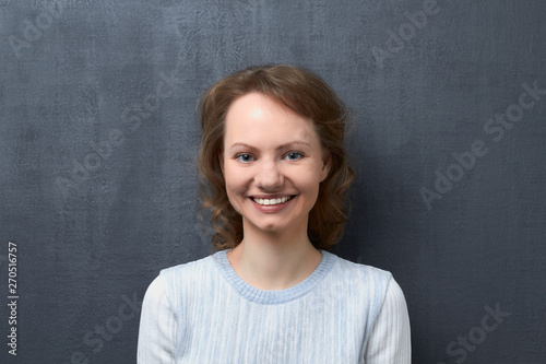 Portrait of cute happy girl smiling broadly © Andrei Korzhyts