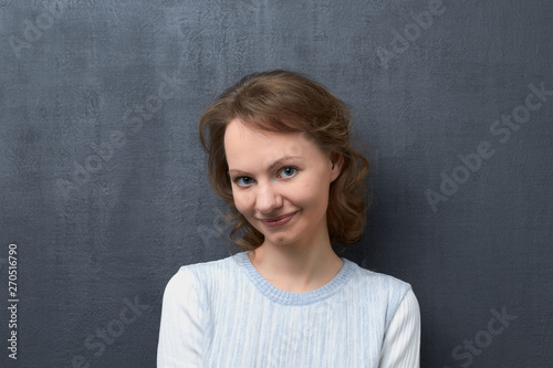 Portrait of romantically smiling girl