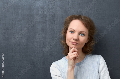 Portrait of thoughtful girl with calm expression