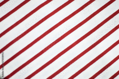 Diagonal lines pattern. red stripe texture background close up.
