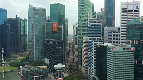 flight over singapore city day time downtown bay aerial panorama 4k  photo