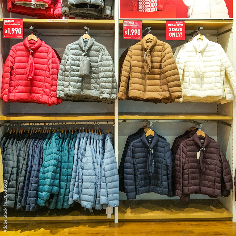 Front of Uniqlo store. Luxury and fashionable brand window display. Winter  collection Welcoming the Christmas Festival. Stock Photo | Adobe Stock