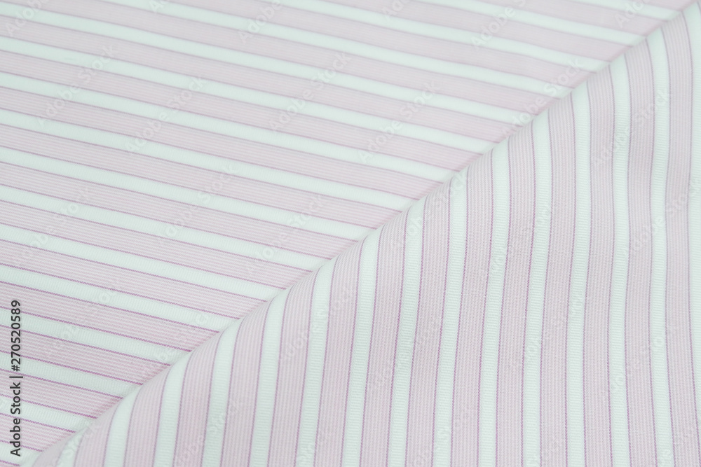 Obraz premium Diagonal lines pattern. Blue and white stripe texture background close up.