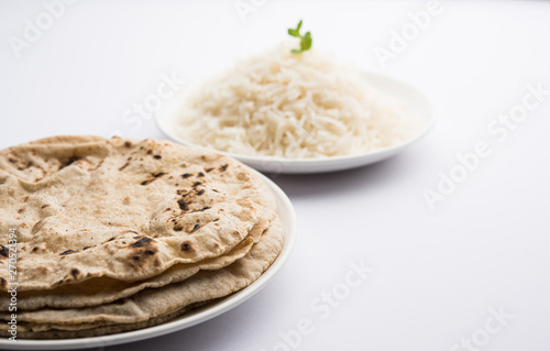 Chapati / Roti with Cooked plain rice, selective focus