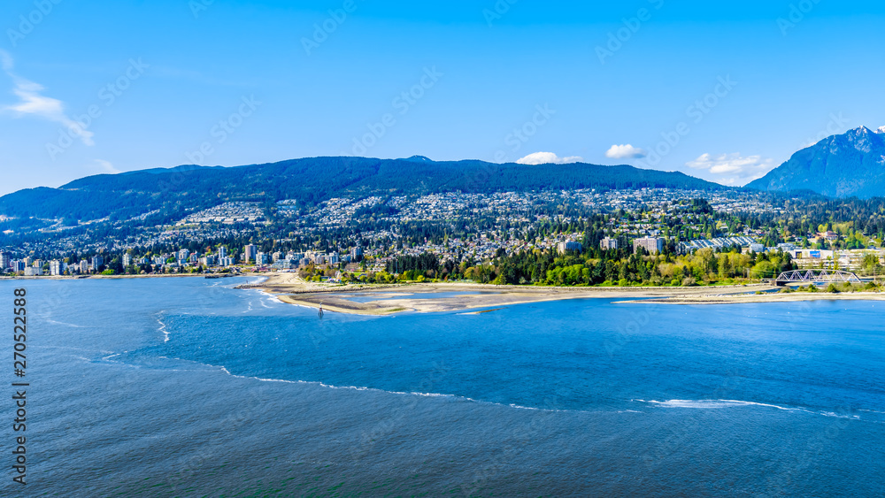 North Vancouver and West Vancouver across Burrard Inlet, the entrance into Vancouver harbor viewed from Prospect Point in Vancouver's Stanley Park 