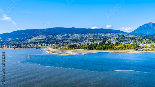 North Vancouver and West Vancouver across Burrard Inlet, the entrance into Vancouver harbor viewed from Prospect Point in Vancouver's Stanley Park 