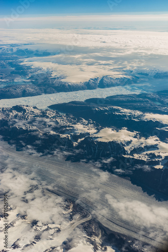Aerial view of Greenland mountains and a glacial river