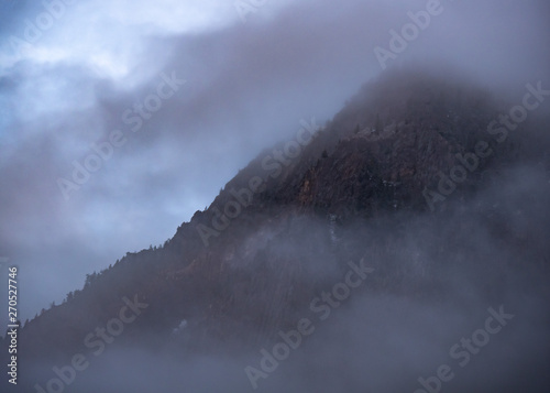 Dense Fog Covering a Mountain
