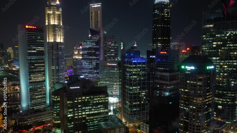 night time illumination singapore downtown rooftops aerial panorama 4k night time illumination singapore downtown rooftops aerial panorama 4k