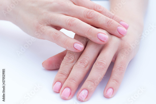beautiful soft hands of a woman and handcream skincare