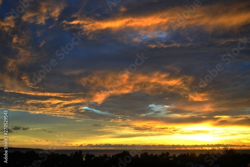 Stunning play of clouds and skies on fire at sunset  © raksyBH