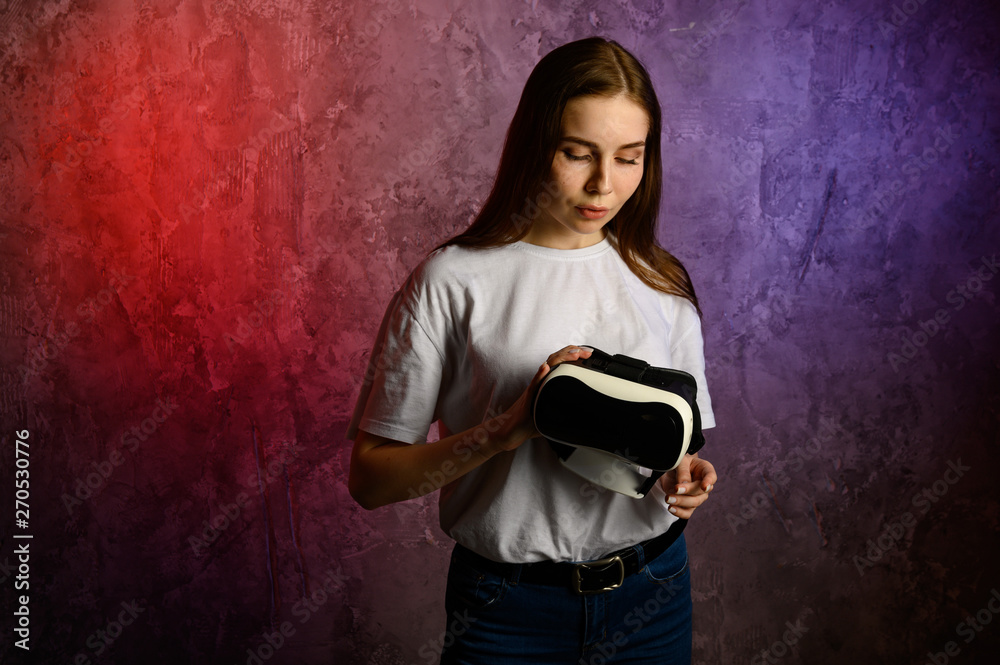 Happy young woman using a virtual reality headset Happy young woman using a virtual reality headset