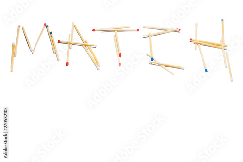The word Match laid out from multi colored head matches on a white isolated background. Lettering made of bright colorful matchsticks. Concept and symbol of flammable danger and fire.