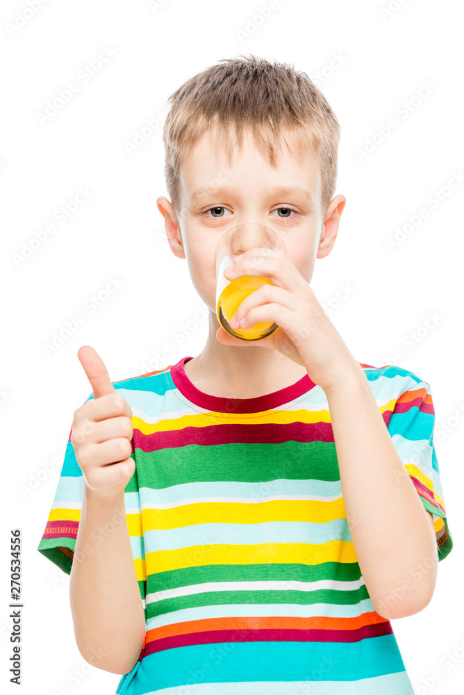 baby drinking juice from oranges on a white background baby drinking juice from oranges on a white background
