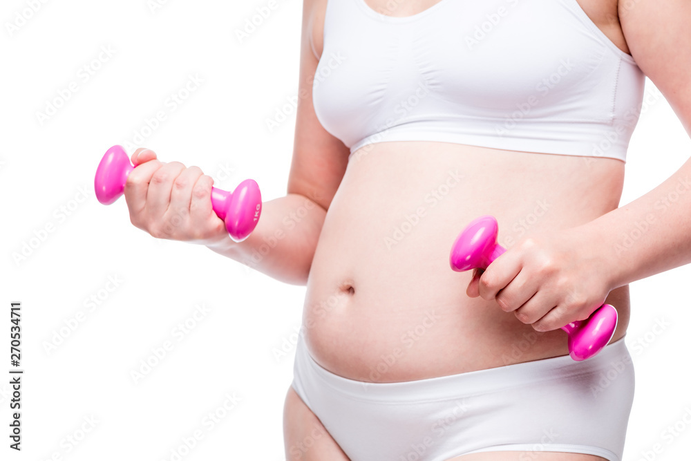 Woman measuring fat belly in underwear Stock Photo by