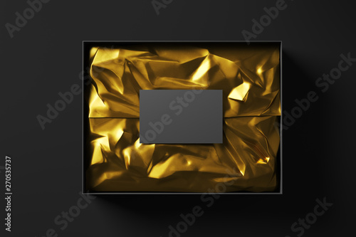 Open black realistic cardboard box with golden wrapping paper and business card. The concept of a business gift. Mock up. Top view. 3d rendering