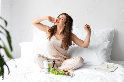 Beautiful young woman havin...