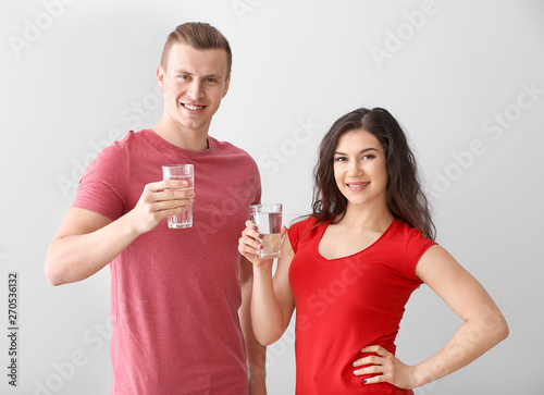 Young couple with glasses o...