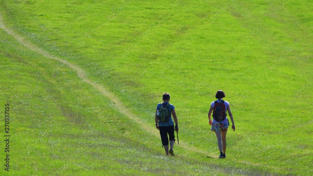 Two Women Walking on the South Downs East Sussex England. Two Women Walking on the South Downs East Sussex England.