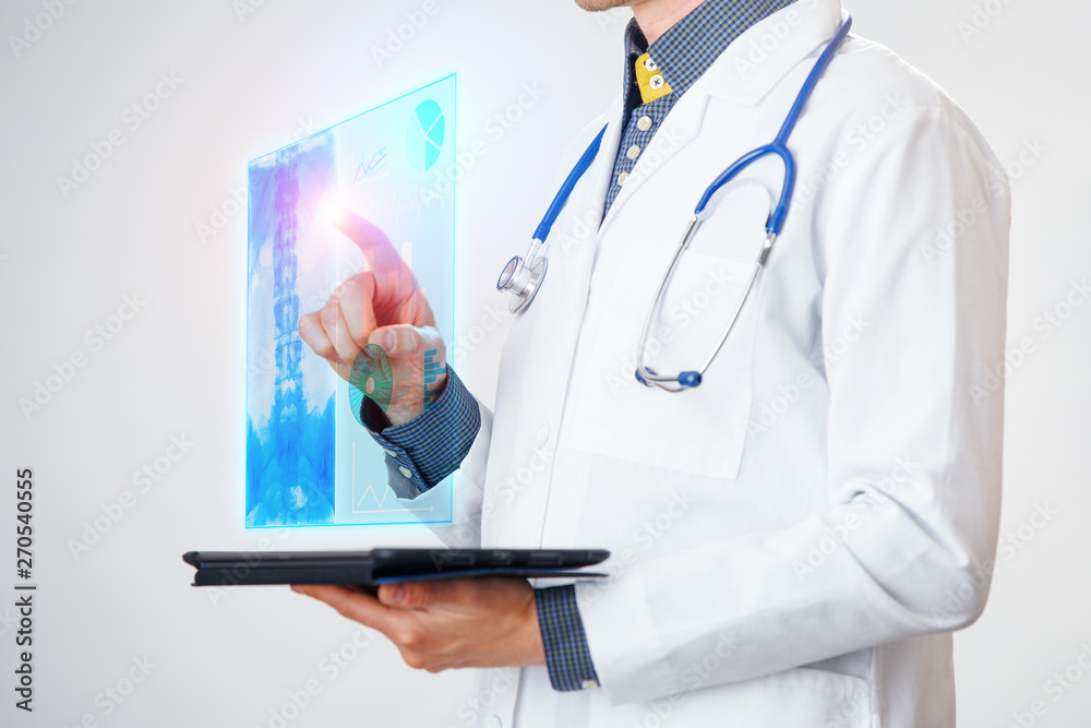 Doctor interacts with virtual screen of new technology for medicine. Doctor interacts with virtual screen of new technology for medicine.