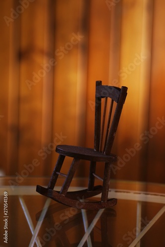 Wooden chair decoration closeup brown wall blur background