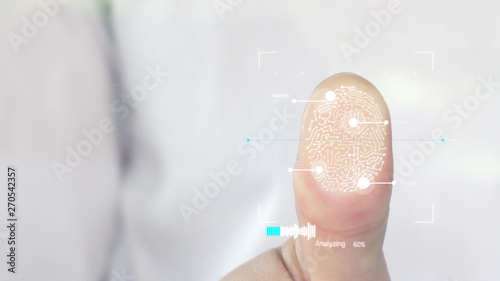 Businessman scan fingerprint biometric identity and approval. photo