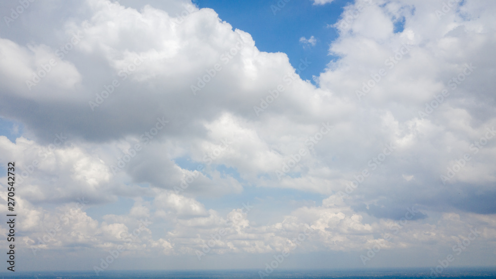 Blue sky background with clouds