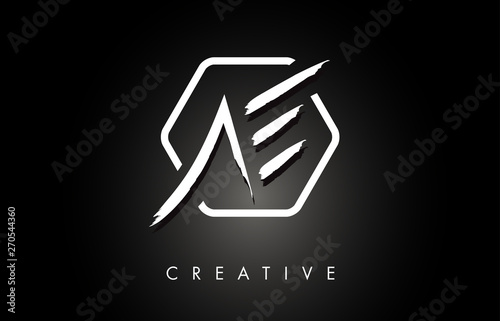 AE A E Brushed Letter Logo Design with Creative Brush Lettering Texture and Hexagonal Shape photo