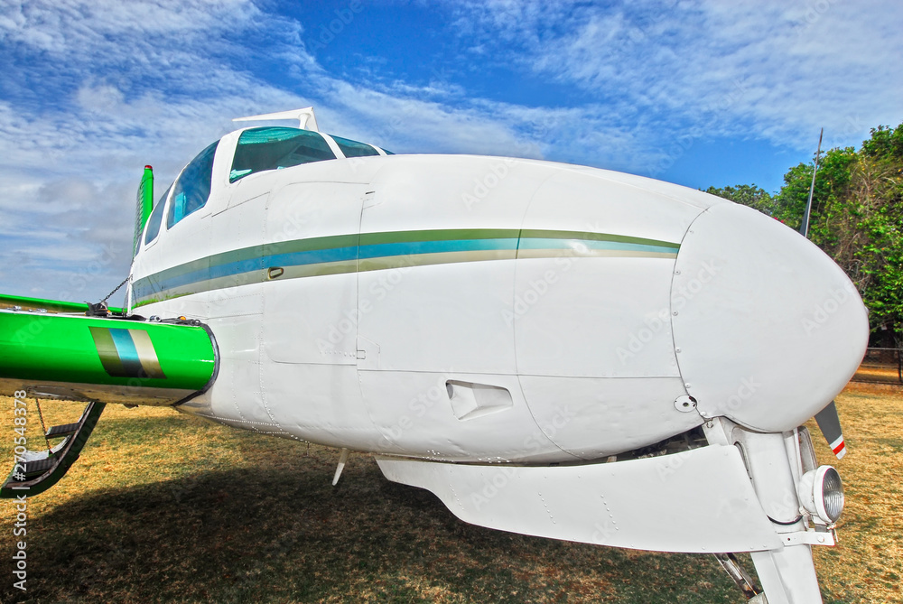 Obraz premium Cuyo Island, Palawan Province, Philippines: Close-up of Twin Beechcraft Bonanza utility aircraft model 50, built 1965, parking at the airport